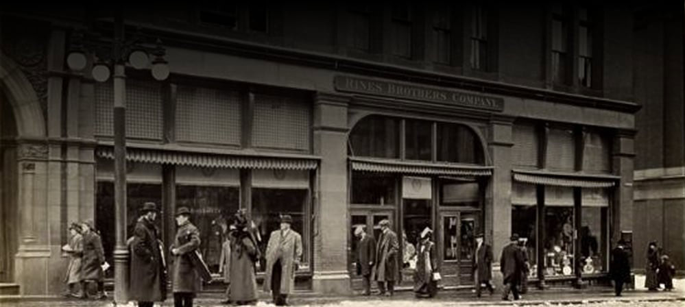 Historical photo of pedestrians in front of the Jones Brothers Company building in Portland, Maine, in the early 1900's